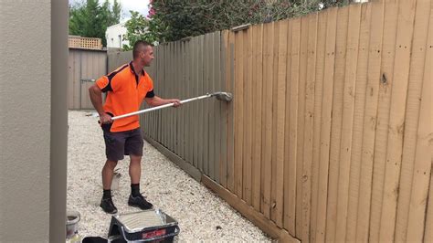 How To Paint A Wood Fence The Fast And Easy Way