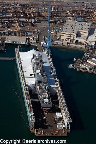 Aerial Photograph Of A Navy Destroyer For Maintenance In The Bae