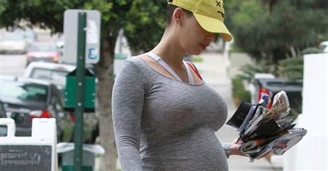 news relationship health and fashion heavily pregnant amber rose displays her huge belly in a