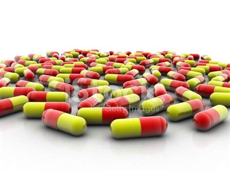 Red And Yellow Capsules Stock Photo Royalty Free Freeimages