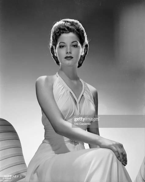 Actress Ava Gardner Looking Demure In A Sleeveless White Evening Gown