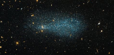 Nasaesa Hubble Space Telescope Of Dwarf Galaxy Eso 540 31 Set Against