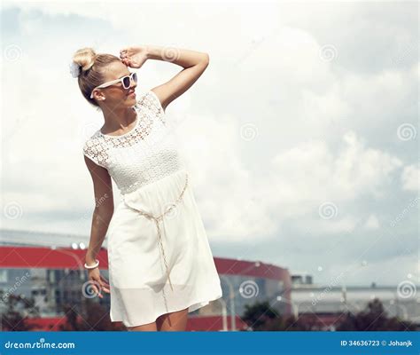 Portrait Of Beautiful Blonde Girl In Sunglasses On Background Blue Sky Stock Image Image Of