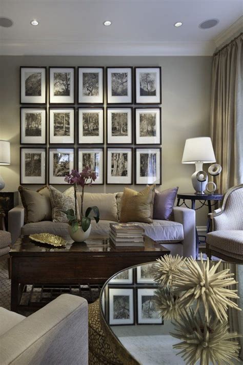 A white fireplace and ceiling beams balance dark walnut floors. 25 Gray Living Room Design Ideas - Decoration Love