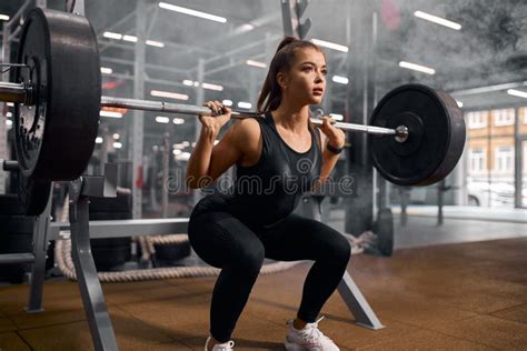 Pretty Fit Woman Squatting With Weight Stock Image Image Of Heavy Belt 163633575
