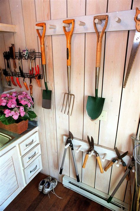 Installing overhead garage storage is a great way to gain storage space while sacrificing zero floor space. 12 tips for DIY garage organization | Diy storage shed, Garden tool storage, Shed storage