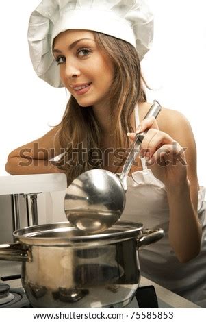Portrait Of Sexy Housewife Tasting Dish In Kitchen Room Stock Photo Shutterstock