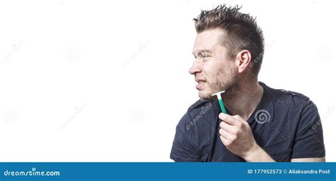 Portrait Of Man Getting Hurt While Shaving With A Razor Stock Image