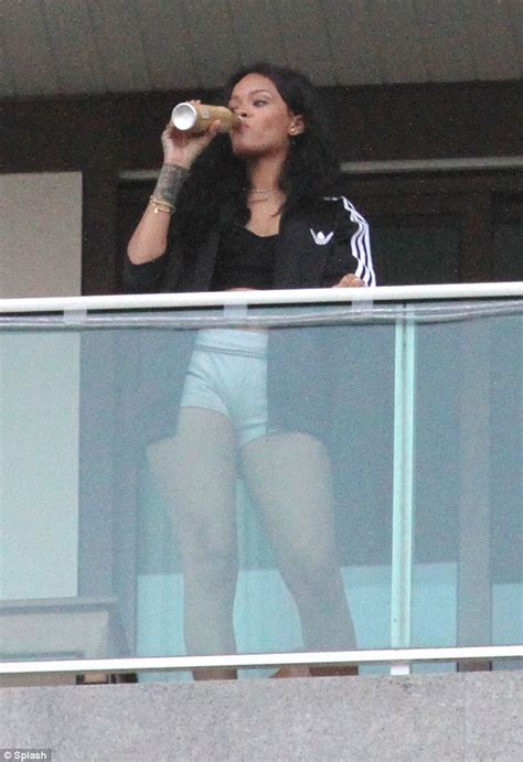 Rihanna Flaunts Her Taut Tummy To Her Fans As She Leaves Rio Hotel