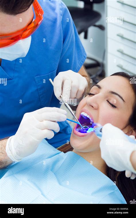 Cute Young Woman At The Dentist Mouth Checkup Stock Photo Alamy