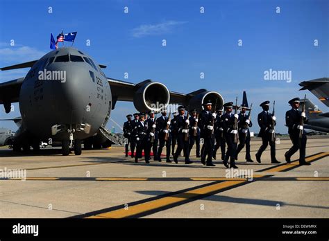 The Joint Base Charleston Honor Guard Retreats During A Delivery