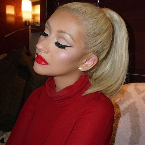 Christina Aguilera Flaunts With Her Signature Red Lipstick