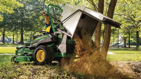 John Deere Unveils New Dump From Seat Material Collection System For