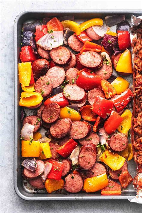 In a skillet on the stove or on a sheet pan (rimmed baking sheet) in the oven on a sheet pan. sausage and bell peppers and onions on a pan in 2020 | Spanish rice, Stuffed peppers, Sheet pan ...