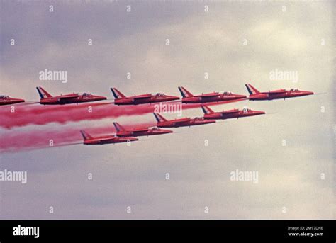 Rafat Raf Red Arrows Folland Gnats Close Formation With Red Smoke Stock