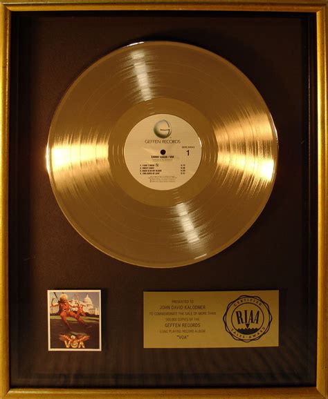 Look below in the featured items to see our most popular custom awards with plaque. Gold Record award presented to JDK for 500,000 sales of Sammy Hagar's "VOA" album | Records, Rud ...