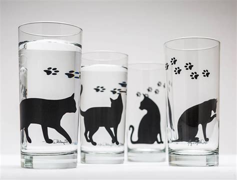 The Perfect T For The Cat Lover In Your Life Four Black Cats With Different Poses Are On
