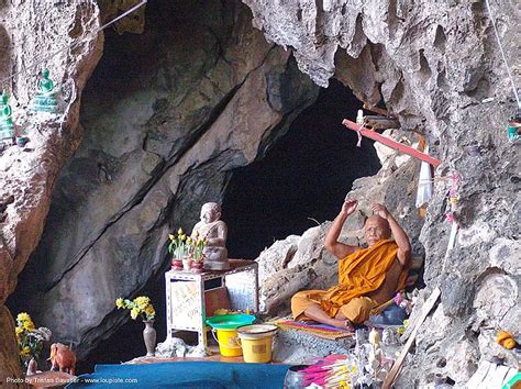Buddhist Monk In Natural Cave Thailand