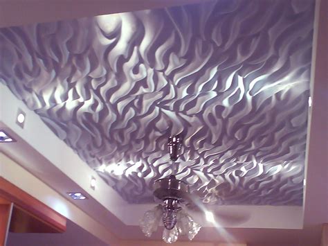 The pop false ceiling is done differently in different areas of the room. False Ceiling Designs in living room: Gypsum bedroom ...