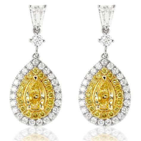 Fancy Yellow Pear Shaped Diamond And Bullet Diamond Dangle Earrings 18k