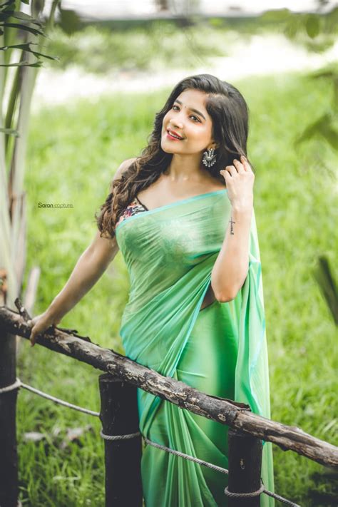 sakshi agarwal shines like a peacock in a green saree