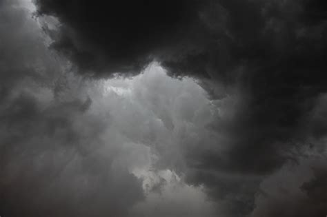 Dark Grey Storm Clouds With Limited Light Stock Photo Download Image