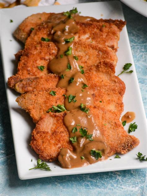 One by one put the chops into the eggs, then into the bread crumbs until all pork chops are completely covered. Pork Schnitzel | Recipe in 2020 | Pork schnitzel recipe ...