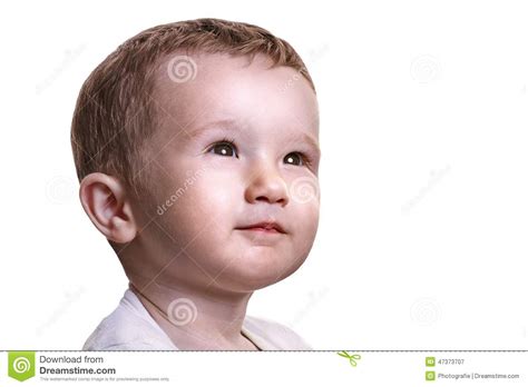 Studio Closeup Portrait Of Little Baby Boy Looking Full Of Expectations
