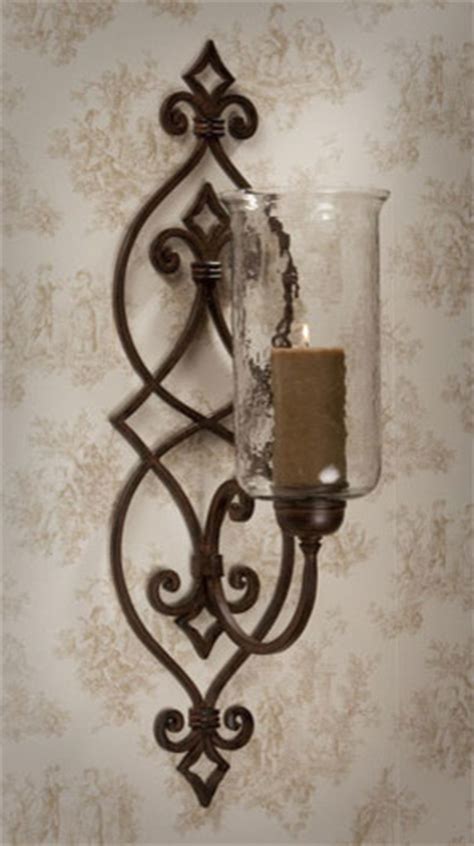 Check out our modern candle sconce selection for the very best in unique or custom, handmade pieces from our sconces shops. Bronze Iron Scroll Candle Sconce with Hammered Globe ...