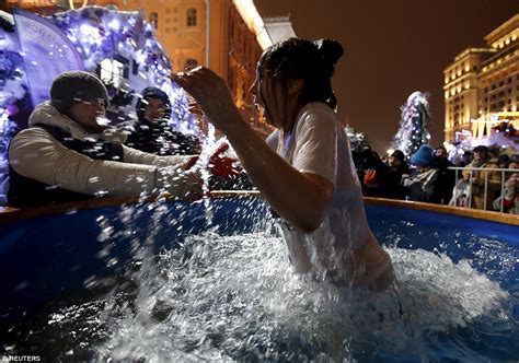 Orthodox Christians Take A Dip In Icy Rivers Across Europe For Epiphany
