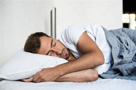 Man Sleeping In Bed — Stock Photo © Allaserebrina 168742734