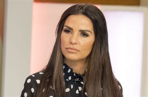 Katie price tries to detract attention away from her very swollen lips stepping out in garish pink tracksuit. Katie Price sparks concern after missing her daughters ...
