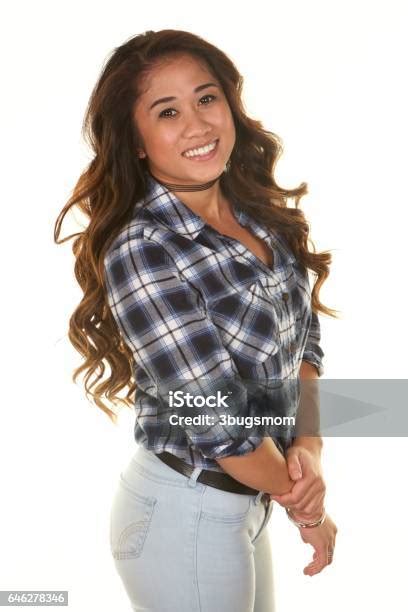 Beautiful Young Filipino Woman On A White Background Smiling Stock