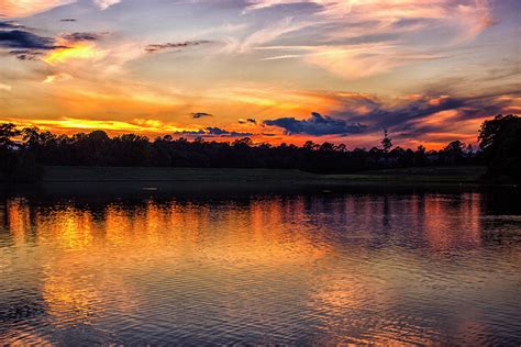 The Sunset Reflection On The Lake Photograph By Thomas Vasas Fine Art