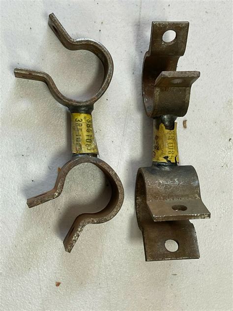 NOS 1964 CORVAIR FRONT STABILIZER BAR CENTER SUPPORT-64 (LF & RT) - 38