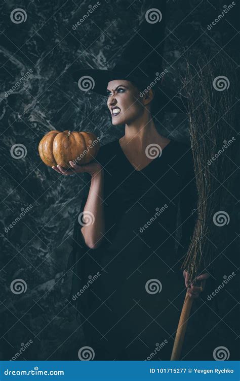 Halloween Witch Holding A Pumpkin And A Broom Stock Image Image Of Fear Jack