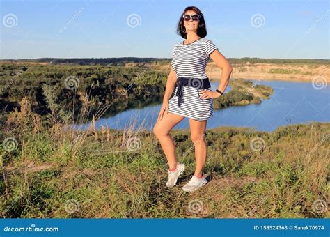 Woman On A Walk By The River Stock Image Image Of Blue Fishing