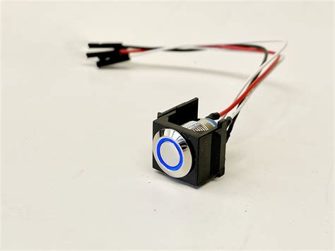 Snap In Momentary Push Button Switch With A Blue Led Ring 3 9v
