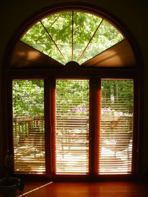 Window cling film, depending on how big the window is you will be covering. Arched Window Treatments, ADJUST-A-VIEW Moveable Arches by ...