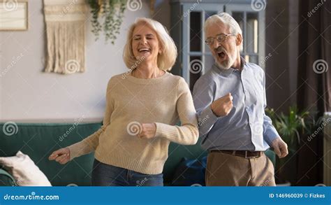 Excited Mature Couple Man And Woman Having Fun Dancing Together Stock Image Image Of Banner