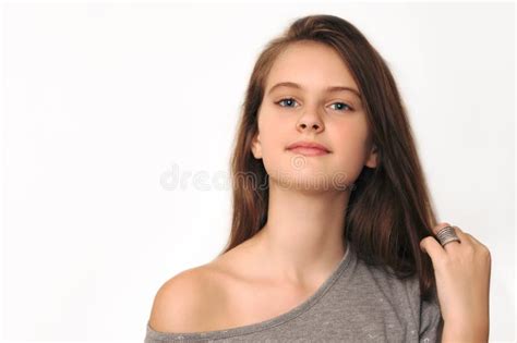 Blue Eyed Brown Haired Shy Girl With Flowing Hair Stock Photo Image