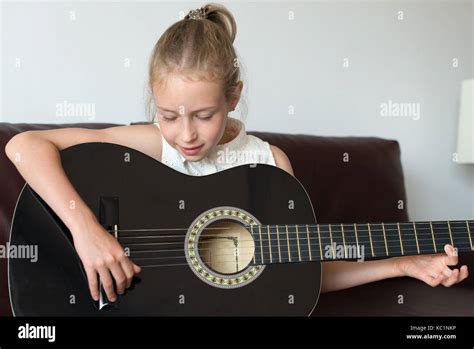 Little Girl Play Guitar Hi Res Stock Photography And Images Alamy