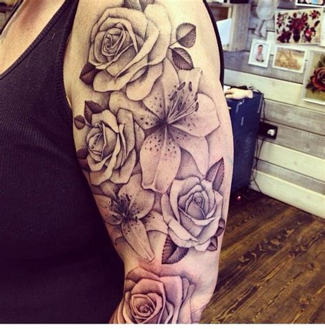 The sweet smell of lily that brightens up your day if you start of your day with it is yet another wonderful idea for tattooing on the back of your ear this time. Shoulder Rose And Lily Tattoo