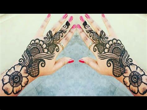 Have a design made in the middle of the palm to add elegance. Easy Arabic gol tikki Mehndi design back hand / New flower mehndi designs/Easy simple mehndi ...