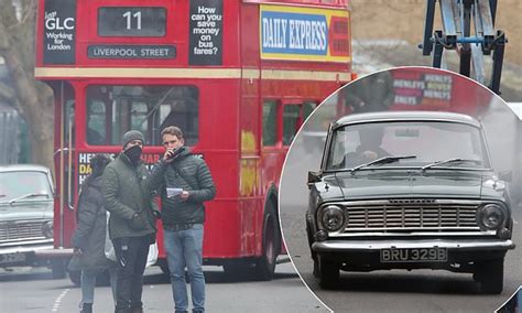 1970s Double Decker Bus And Classic Cars Are Seen On Set Of Sex Pistols