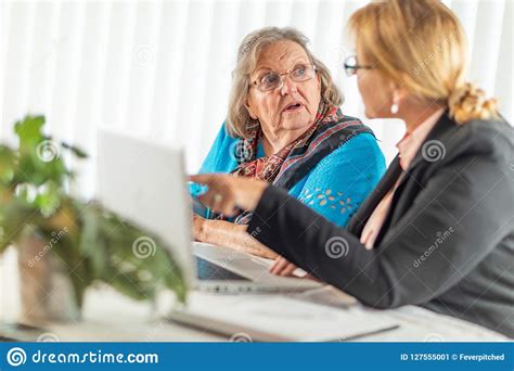 curious senior adult lady on laptop computer stock image image of laptop elderly 127555001