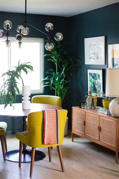 A small colorful living room with a neutral sofa, a turquoise rug, a boho ottoan, pretty plates and an artwork. 15 Best Paint Colors for Small Rooms - Paint Tips for ...