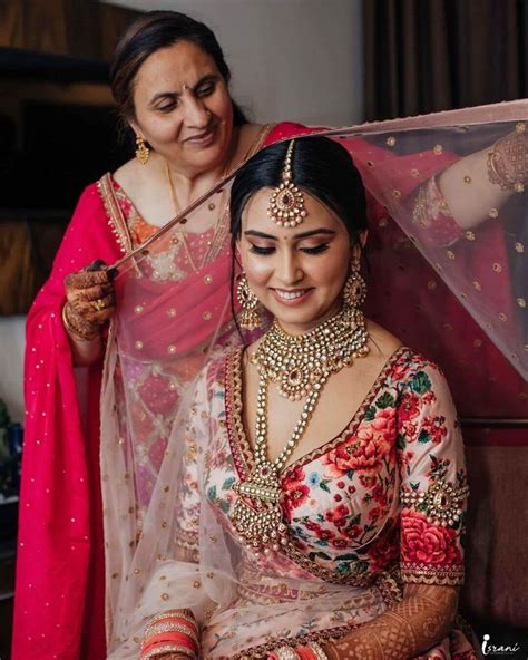 mother daughter dresses and shots ideas for an indian wedding floral lehenga red lehenga pink