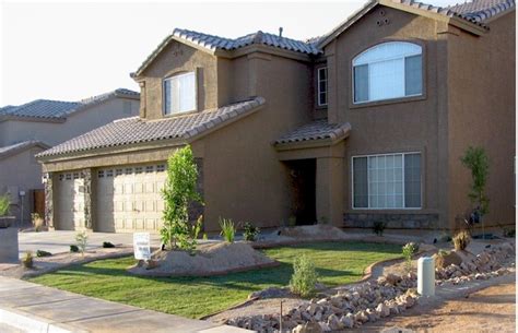 Trimming a palm tree it will cost you between $45 and $945. Arizona Tropical landscape design with sod, palm trees ...