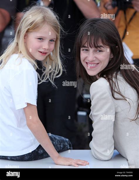 Morgana Davies L And Charlotte Gainsbourg Arrive At A Photocall For